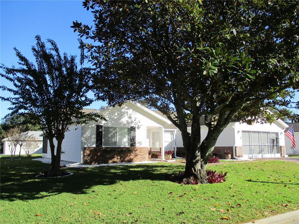 11283 Southwest 139th Place Dunnellon, FL 34432 - Photo 54 of 84 a front view of a house with garden