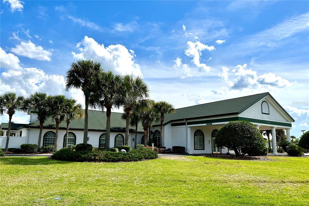 11283 Southwest 139th Place Dunnellon, FL 34432 - Photo 65 of 84 a front view of house with yard and trees