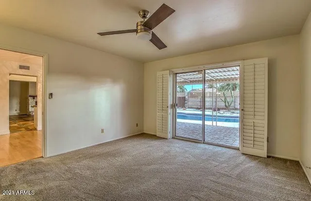 a bathroom with a sink vanity and mirror
