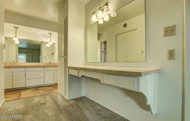 a view of a door and a window