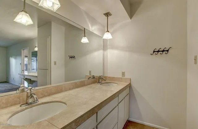 a view of an empty room with a fireplace