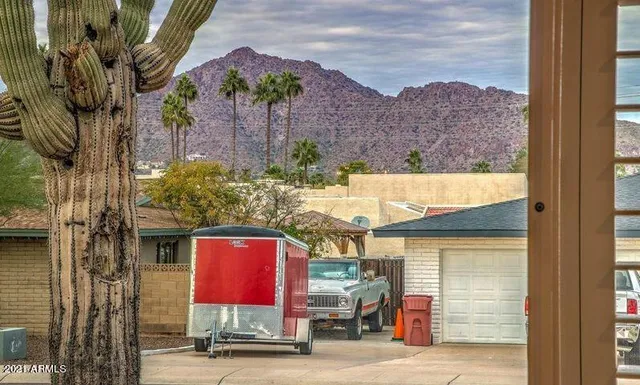 a view of a house with a street