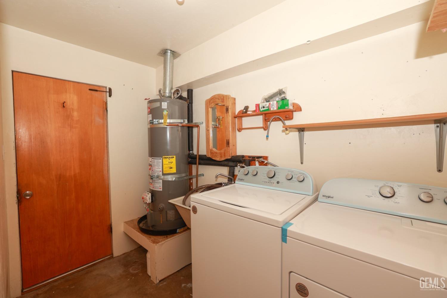 Undisclosed Address Lake Isabella, CA 93240 - Photo 32 of 46 a utility room with dryer and washer