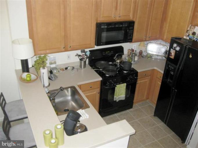 12001 Market Street, Unit 469 Reston, VA 20190 - Photo 6 of 10 Kitchen