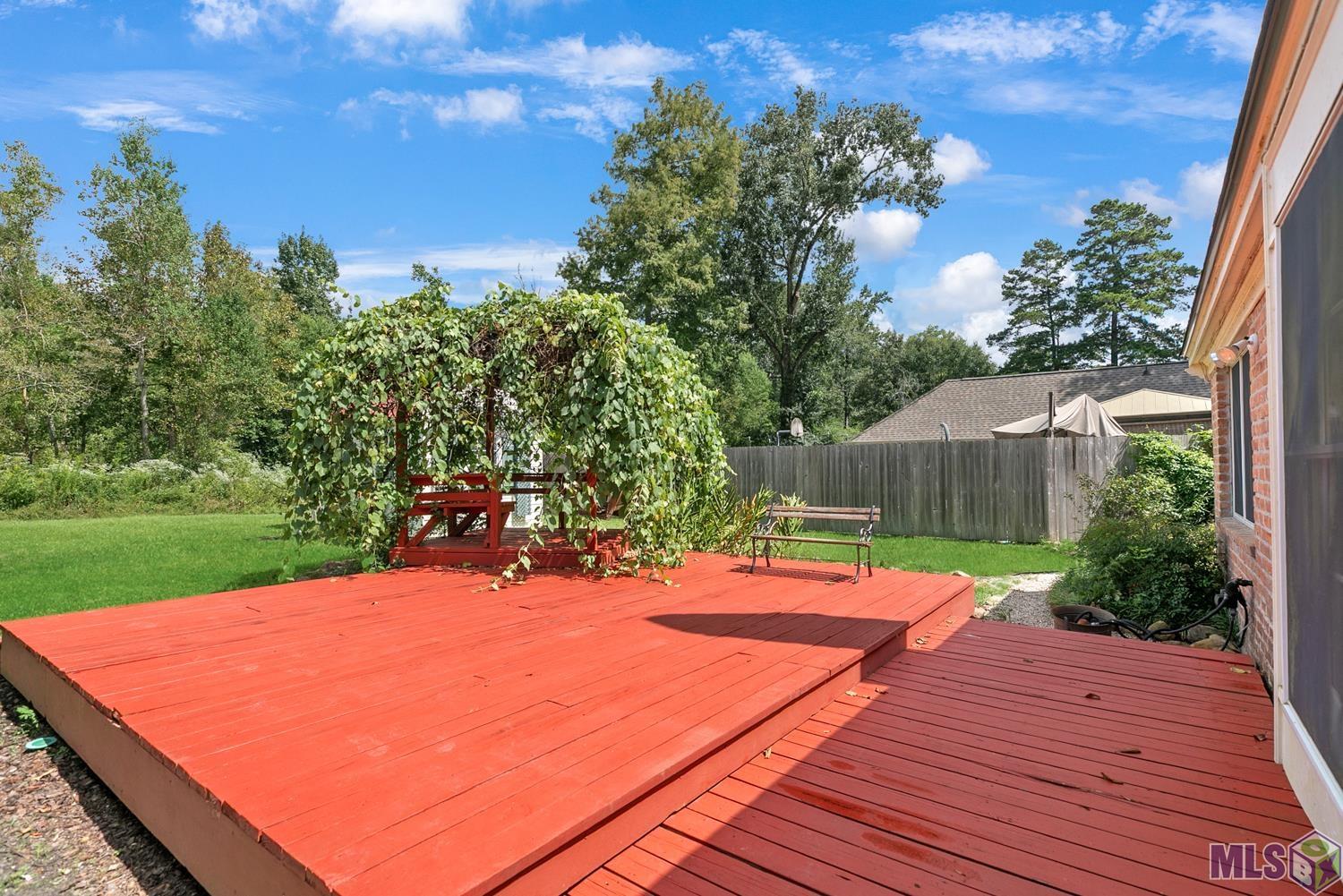 3635 Woodland Ridge Boulevard Baton Rouge, LA 70816 - Photo 18 of 21 CANOPY DRAPPED GAZEBO WITH SWING-COOLING RELAXING PLACE