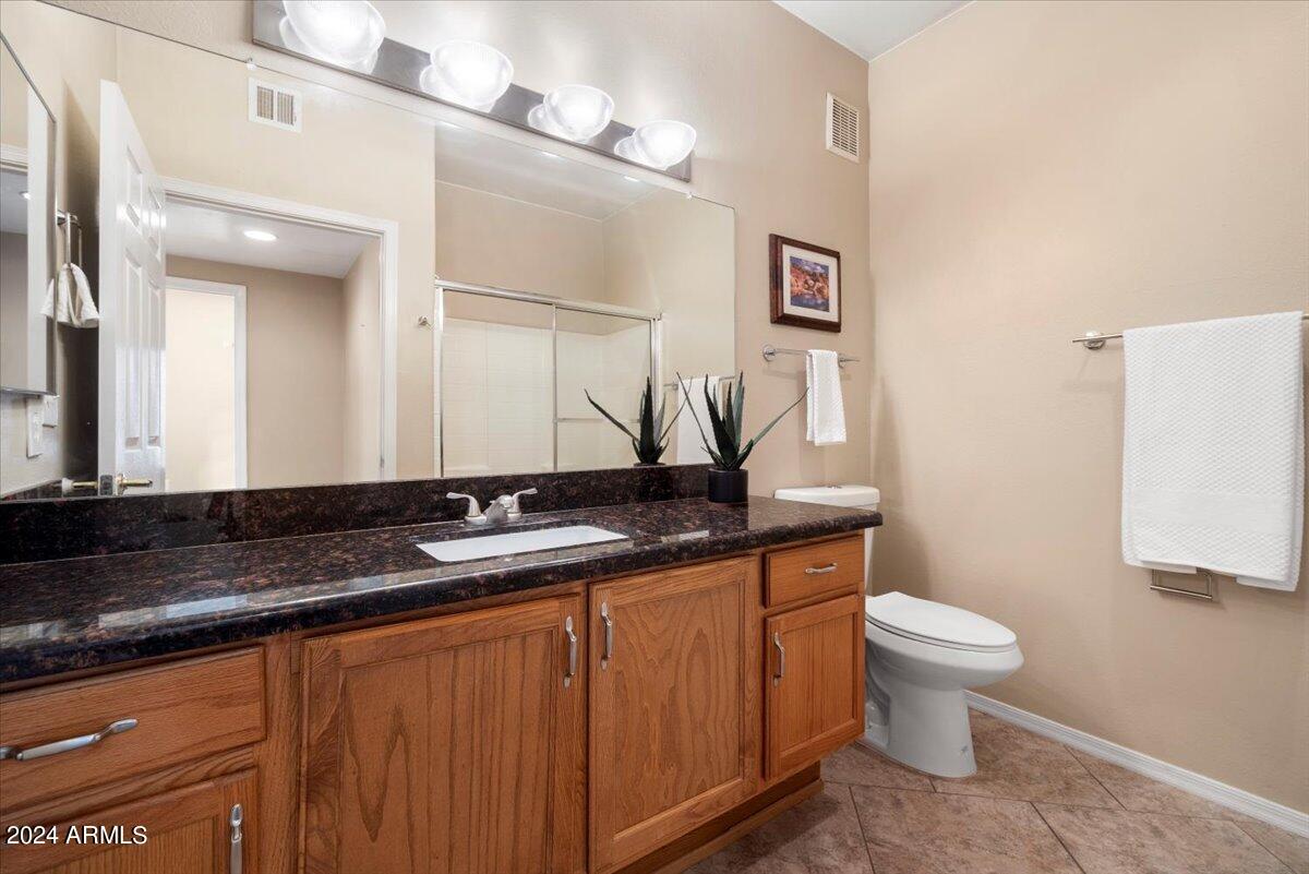 10030 West Indian School Road, Unit 128 Phoenix, AZ 85037 - Photo 13 of 16 Primary Bathroom