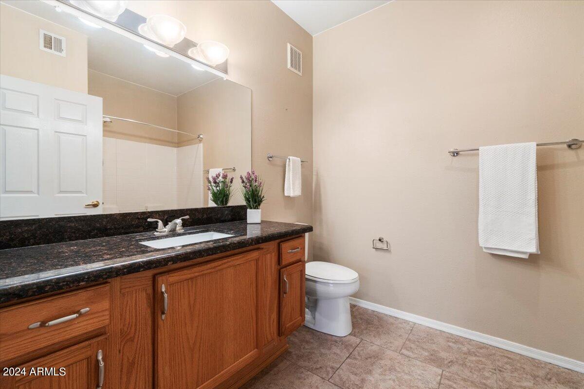 10030 West Indian School Road, Unit 128 Phoenix, AZ 85037 - Photo 14 of 16 Updated Bathroom