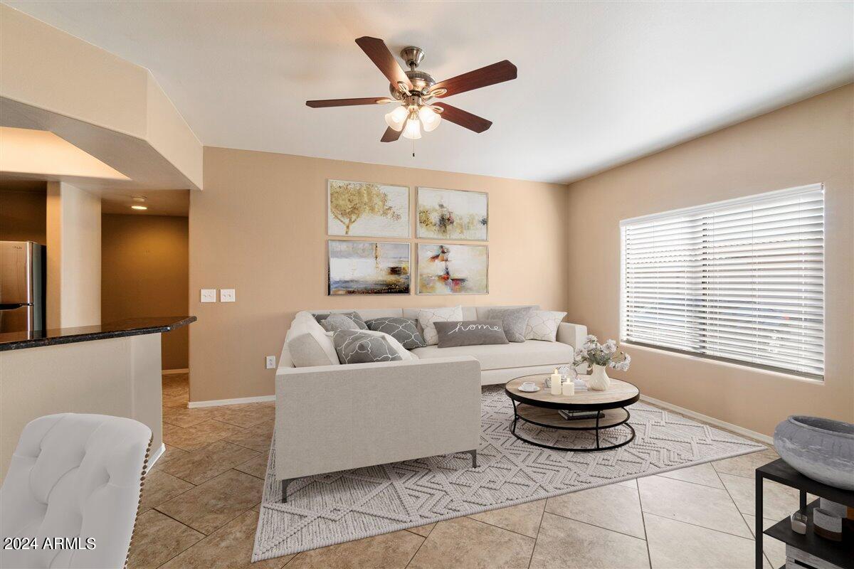 10030 West Indian School Road, Unit 128 Phoenix, AZ 85037 - Photo 3 of 16 Great room Open to Kitchen