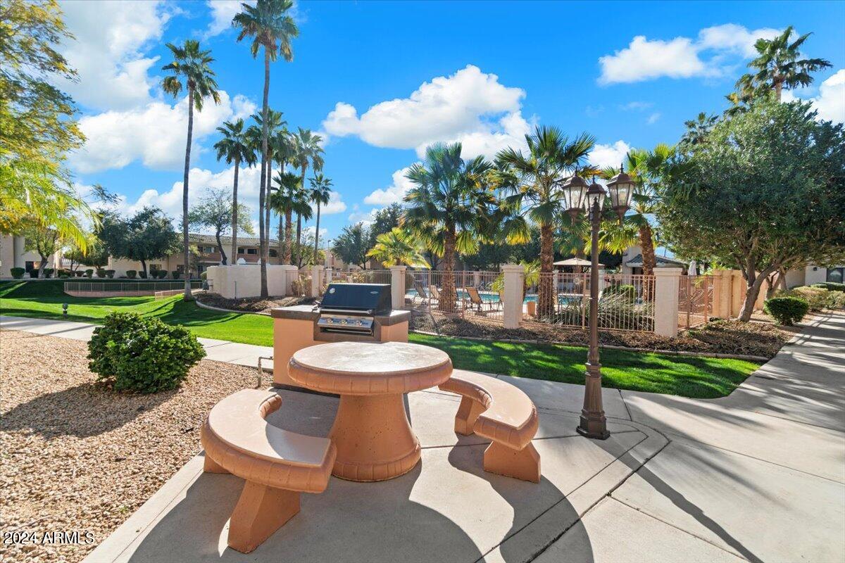 10030 West Indian School Road, Unit 128 Phoenix, AZ 85037 - Photo 9 of 16 BBQ By the Pool