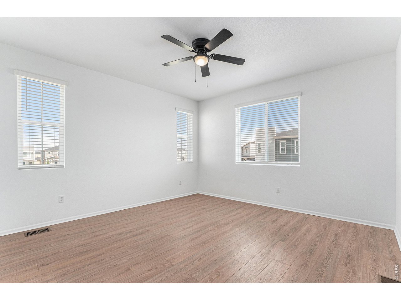 5230 Warrior Street Frederick, CO 80504 - Photo 6 of 12 Primary suite with new vinyl flooring