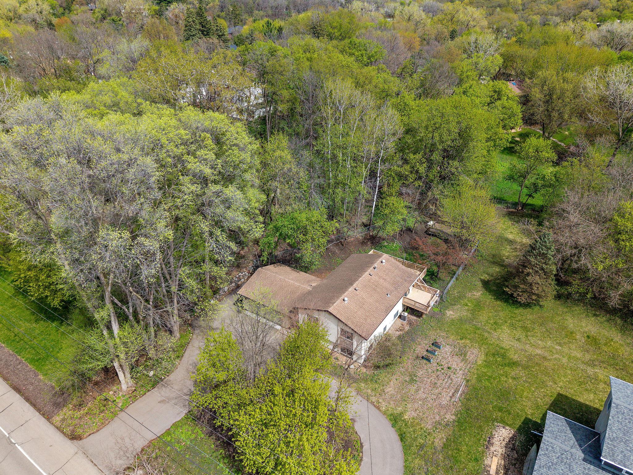 4935 Woodland Road Minnetonka, MN 55345 - Photo 2 of 35