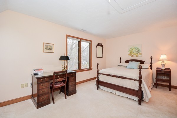 583 Sugar Road Bolton, MA 01740 - Photo 20 of 30 a bedroom with furniture and a window