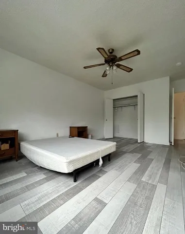 a living room with furniture and white walls