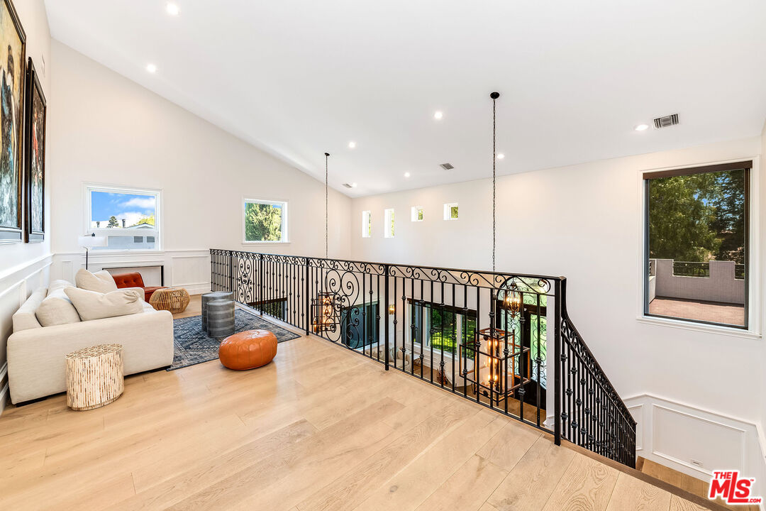 4843 Ledge Avenue Toluca Lake, CA 91601 - Photo 16 of 31 a view of a living room and a wooden floor