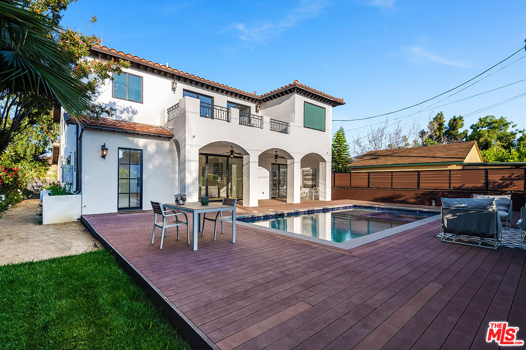 4843 Ledge Avenue Toluca Lake, CA 91601 - Photo 28 of 31 a view of a house with swimming pool and sitting area
