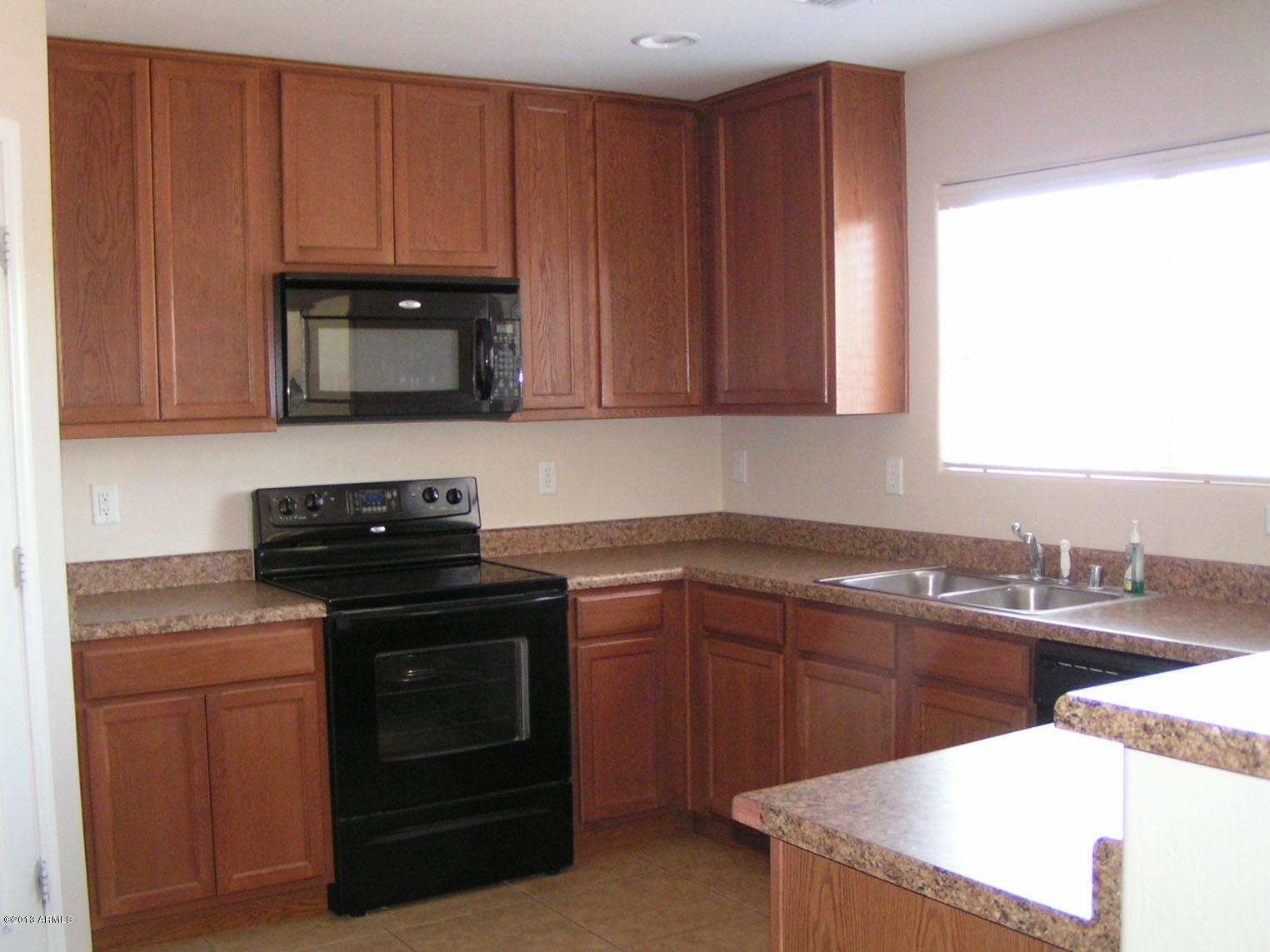 16746 West Adams Street Goodyear, AZ 85338 - Photo 2 of 28 Kitchen