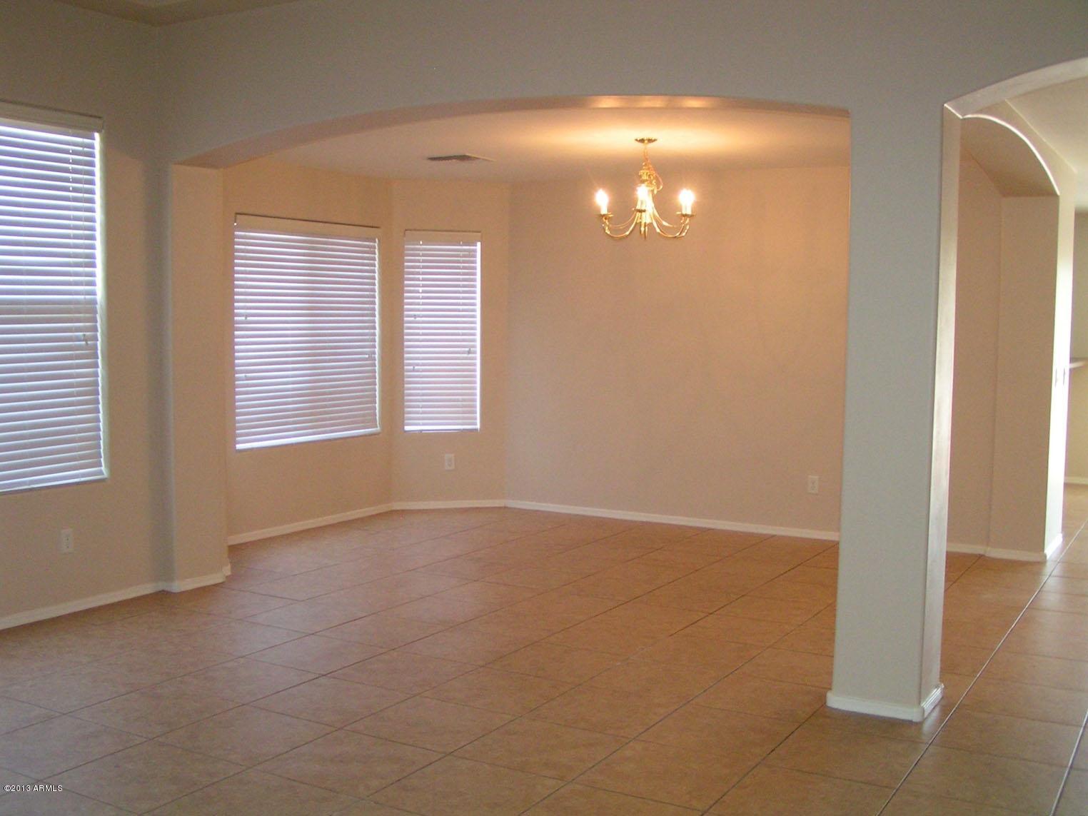 16746 West Adams Street Goodyear, AZ 85338 - Photo 9 of 28 Dining - Great Room