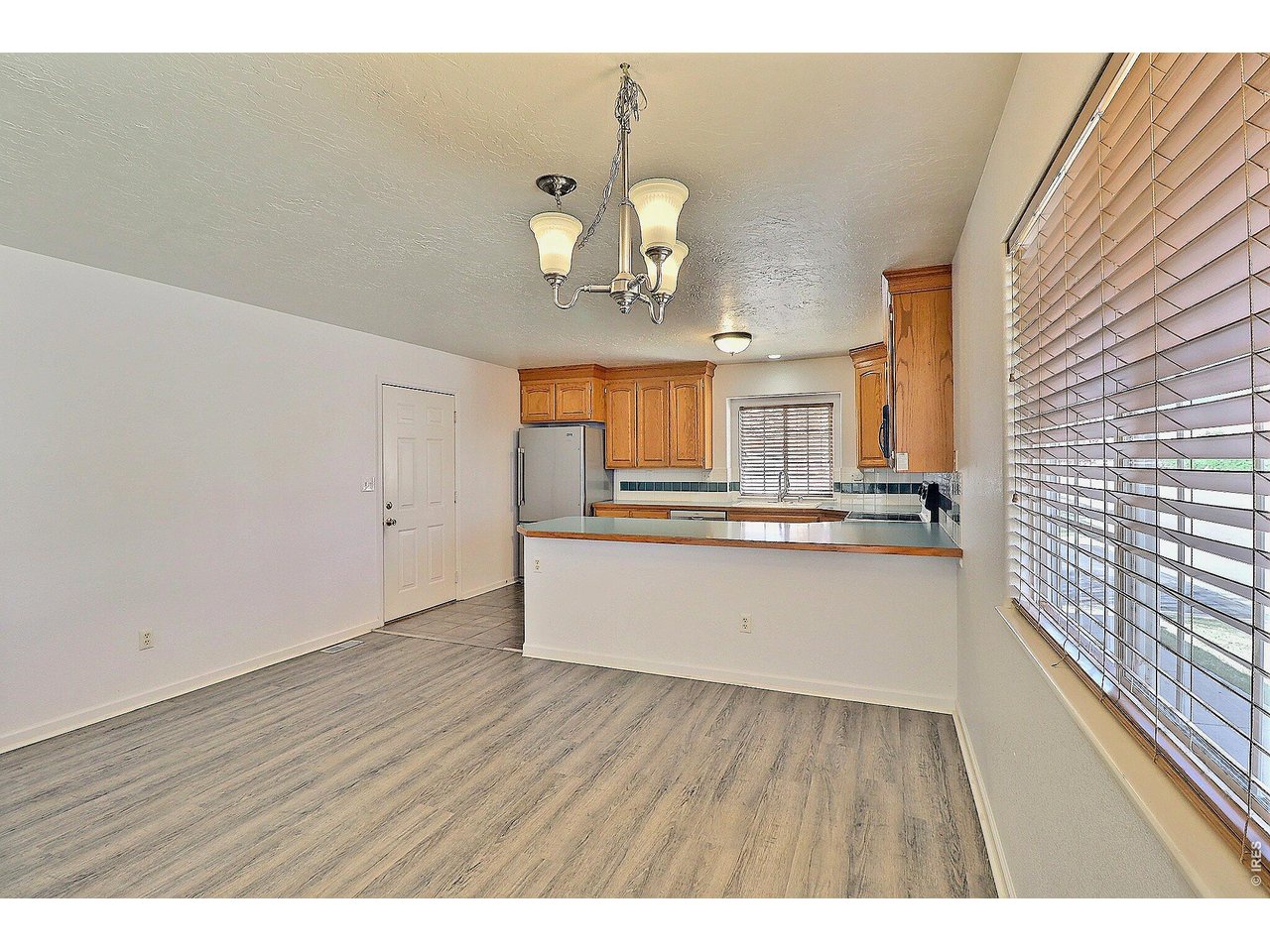 5226 West 11th Street Greeley, CO 80634 - Photo 12 of 34 Awesome Dining Room and Kitchen