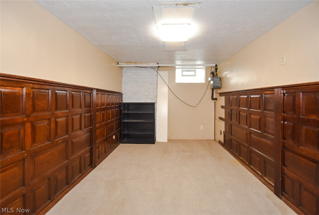 272 Somerset Road Akron, OH 44313 - Photo 15 of 32 Cherry paneled walls, lower level office.