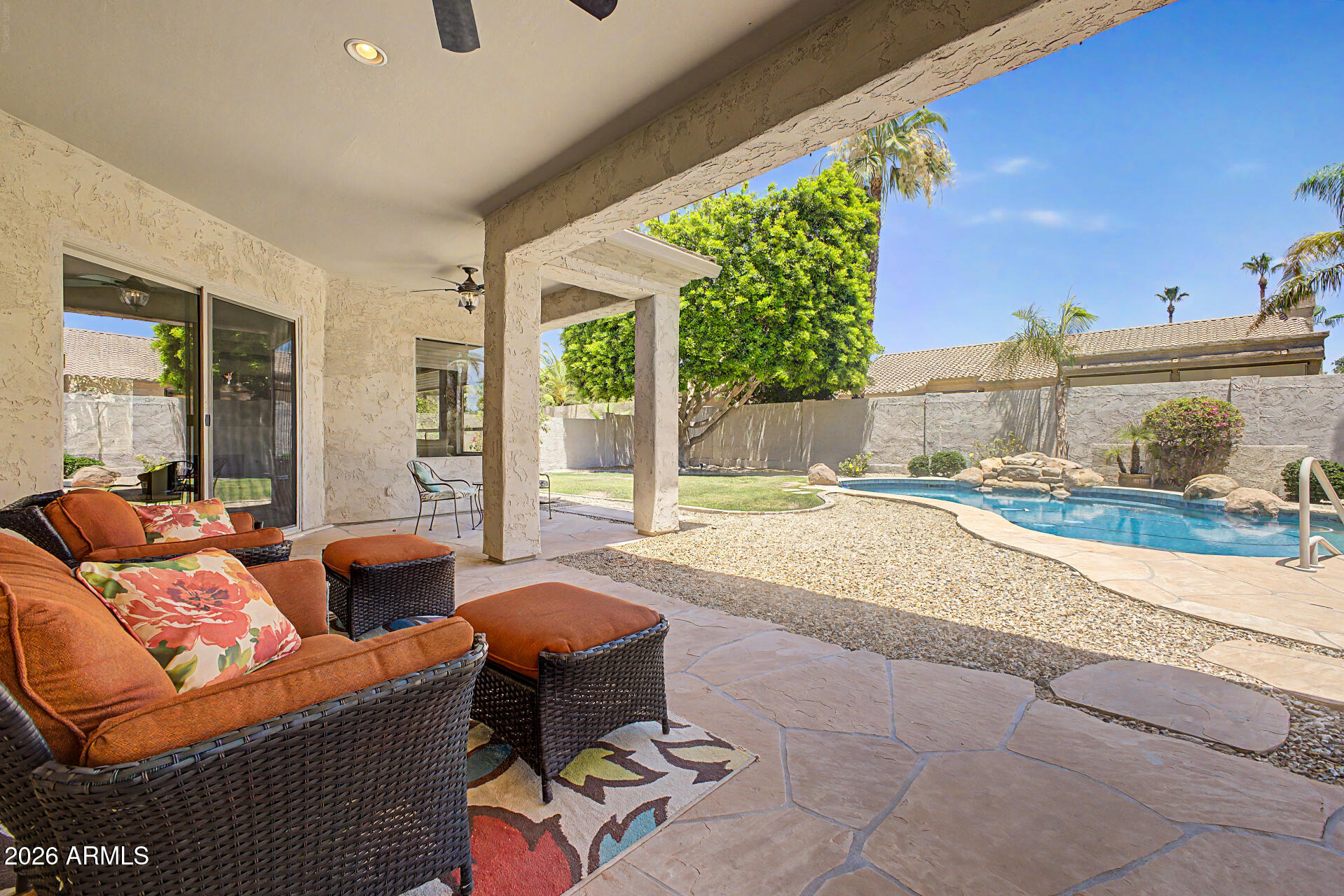 1632 West Frye Road Phoenix, AZ 85045 - Photo 25 of 37 a swimming pool with outdoor seating and yard