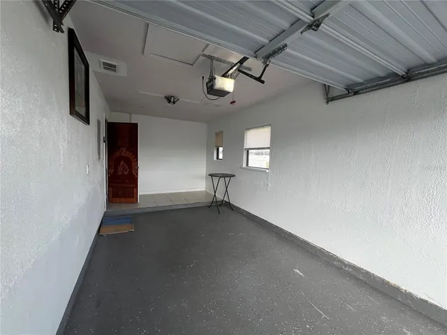 a view of swimming pool with outdoor seating and yard