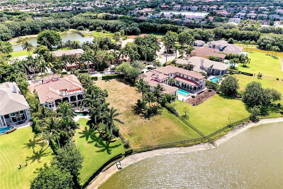 17138 Ave Le Rivage Boca Raton, FL 33496 - Photo 13 of 17 an aerial view of residential houses with outdoor space