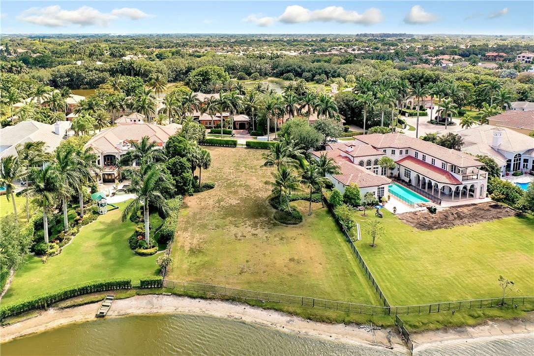 17138 Ave Le Rivage Boca Raton, FL 33496 - Photo 6 of 17 a view of a swimming pool with a lake view