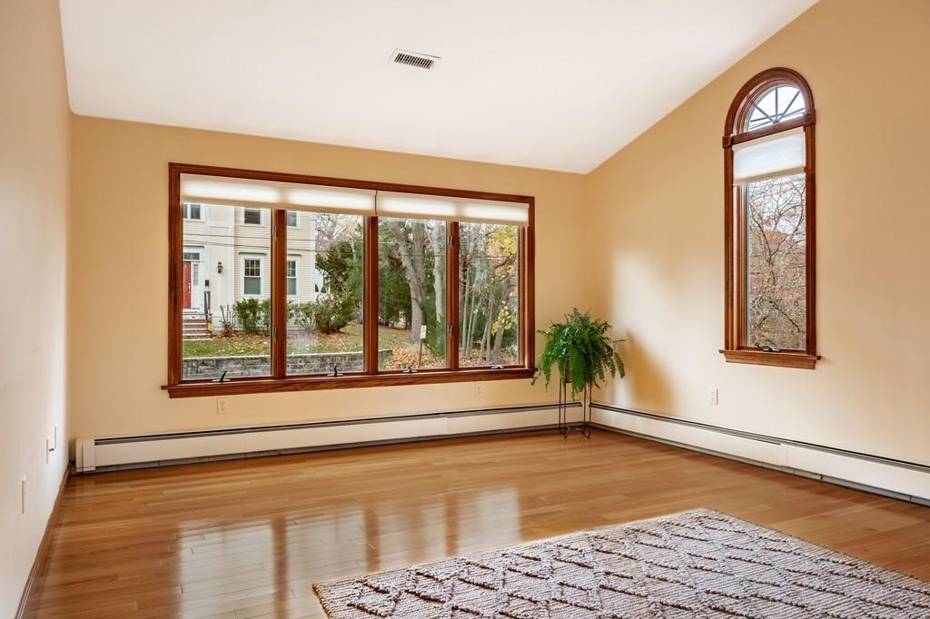 2 Alben Street Winchester, MA 01890 - Photo 14 of 33 a view of a room with window wooden floor and front door