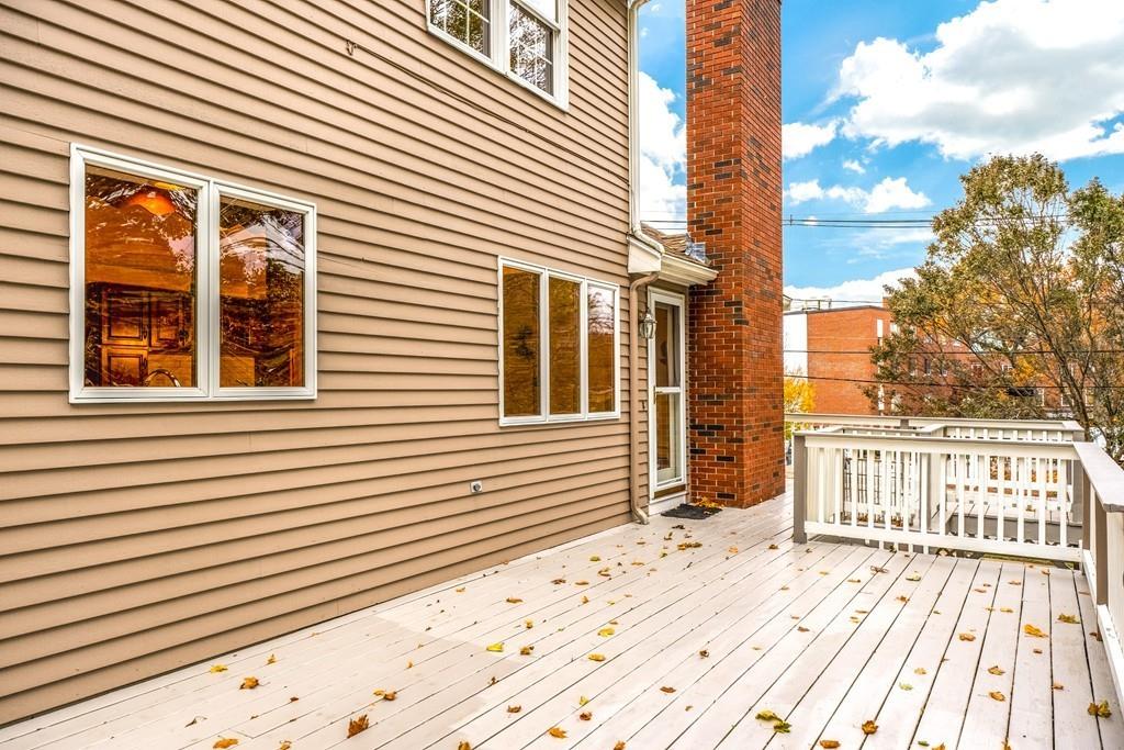 2 Alben Street Winchester, MA 01890 - Photo 17 of 33 a view of a house with a wooden floor