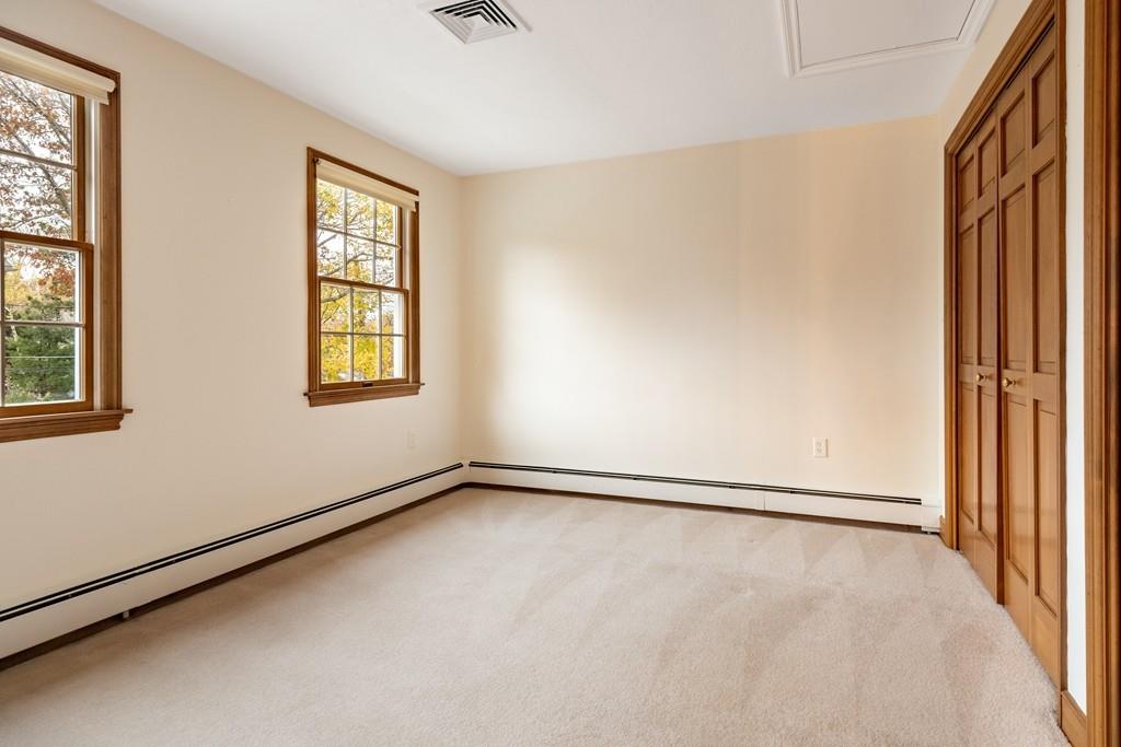 2 Alben Street Winchester, MA 01890 - Photo 20 of 33 an empty room with windows and closet