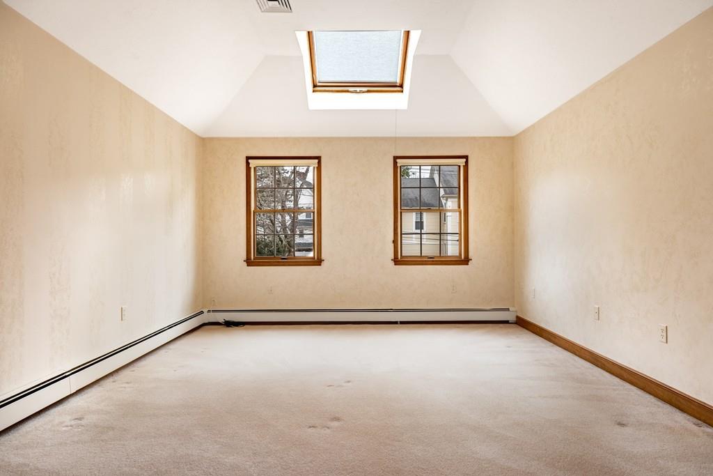 2 Alben Street Winchester, MA 01890 - Photo 23 of 33 an empty room with windows