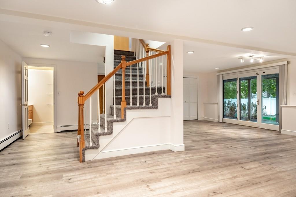 2 Alben Street Winchester, MA 01890 - Photo 25 of 33 a view of entryway and hall with wooden floor