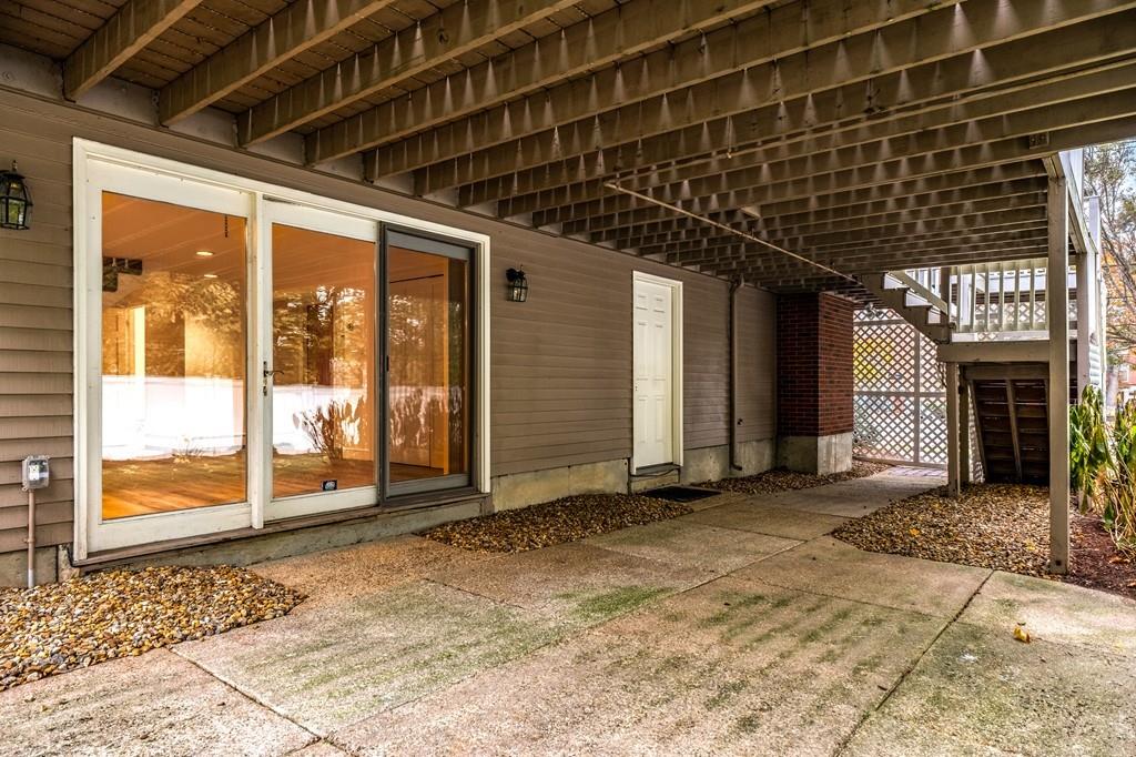 2 Alben Street Winchester, MA 01890 - Photo 30 of 33 a view of a room with wooden floor and windows