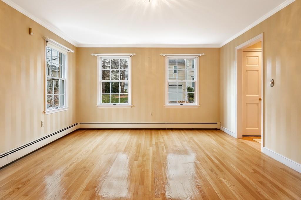 2 Alben Street Winchester, MA 01890 - Photo 8 of 33 a view of an empty room with glass door and wooden floor