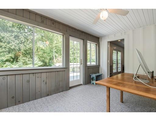 8 Jefferson Drive Acton, MA 01720 - Photo 13 of 38 a living room with furniture and a large window