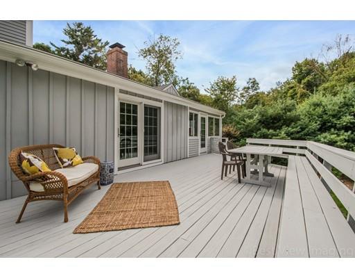 8 Jefferson Drive Acton, MA 01720 - Photo 23 of 38 a balcony with table and chairs