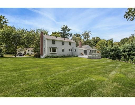 8 Jefferson Drive Acton, MA 01720 - Photo 27 of 38 a front view of a house with garden