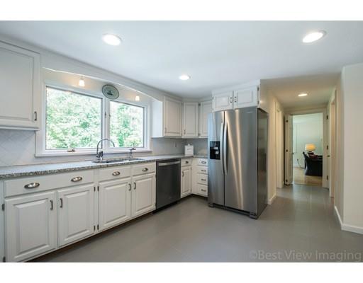 8 Jefferson Drive Acton, MA 01720 - Photo 3 of 38 a kitchen with refrigerator and window