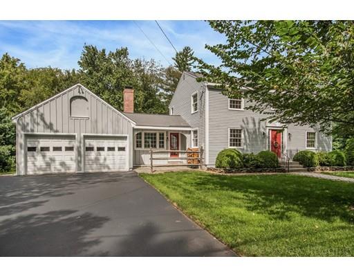 8 Jefferson Drive Acton, MA 01720 - Photo 32 of 38 a front view of a house with a garden