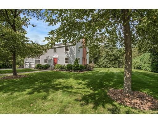 8 Jefferson Drive Acton, MA 01720 - Photo 34 of 38 a view of a backyard with large trees