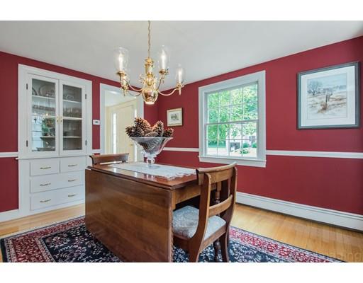 8 Jefferson Drive Acton, MA 01720 - Photo 10 of 38 a view of a dining room with furniture a chandelier and window