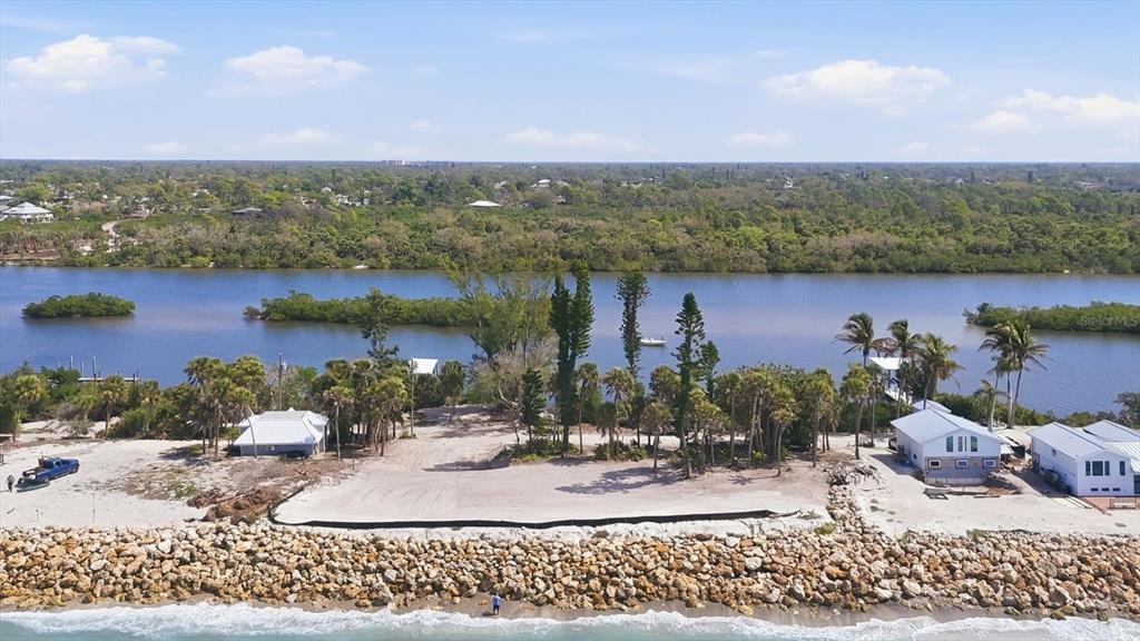 804 North Manasota Key Road Englewood, FL 34223 - Photo 17 of 23 a view of a terrace with a table and chairs