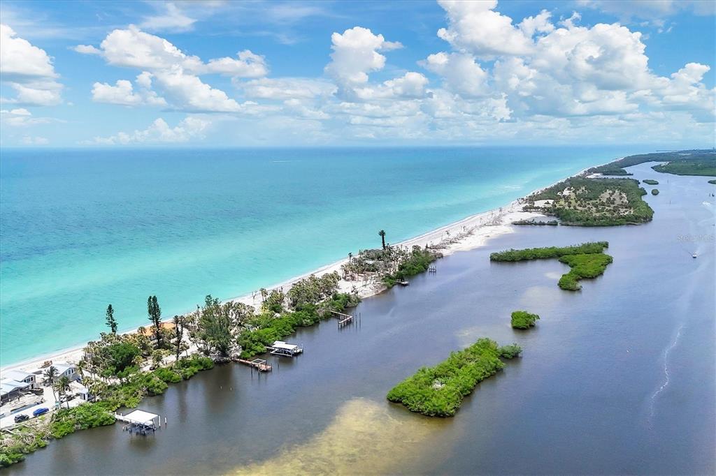 804 North Manasota Key Road Englewood, FL 34223 - Photo 2 of 23 an aerial view of a house with a yard