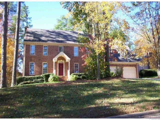 7913 Sutterton Court Raleigh, NC 27615 - Photo 1 of 1 a front view of a house with garden