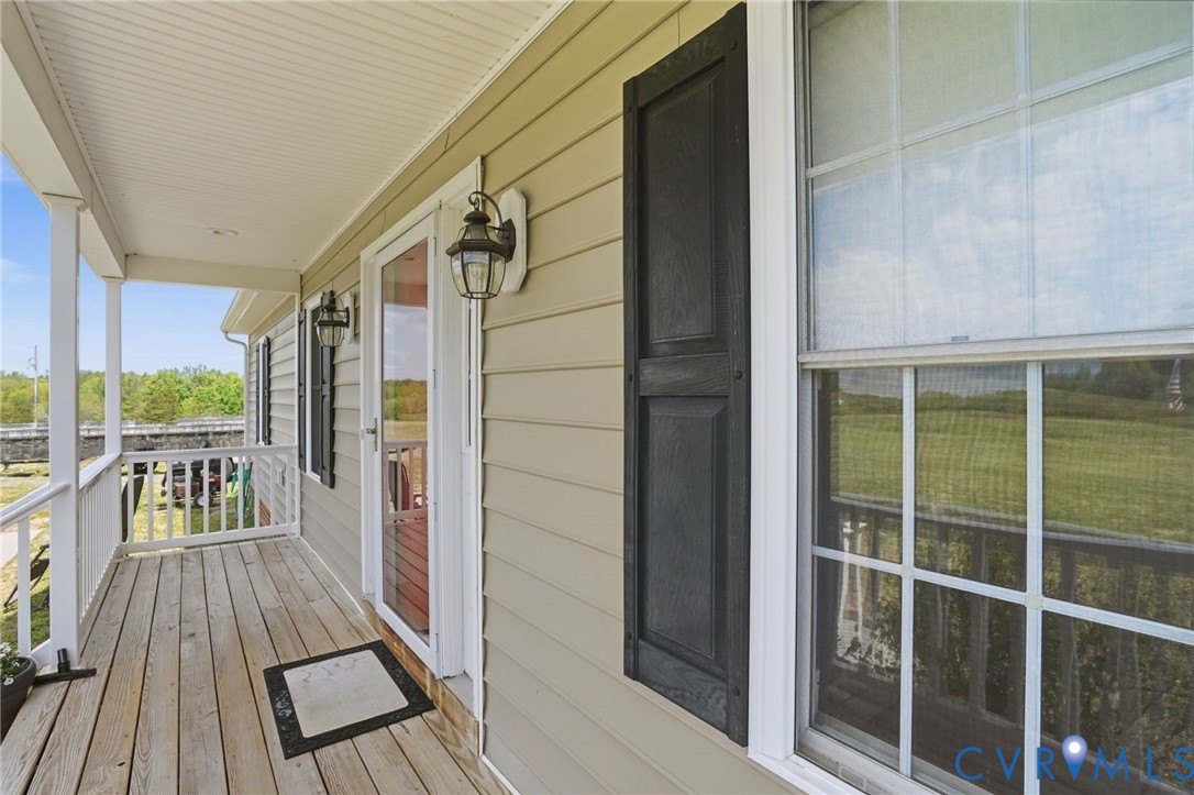 19012 Teman Road Beaverdam, VA 23015 - Photo 33 of 41 a view of balcony with wooden floor