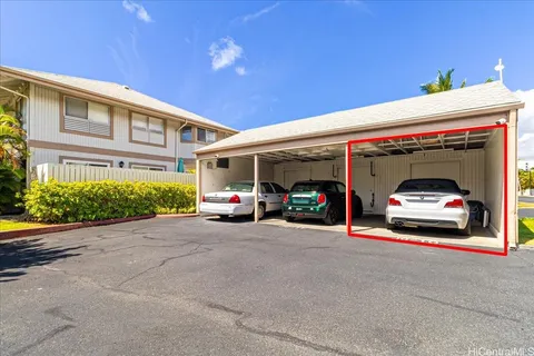 a view of a swimming pool with a lounge chairs