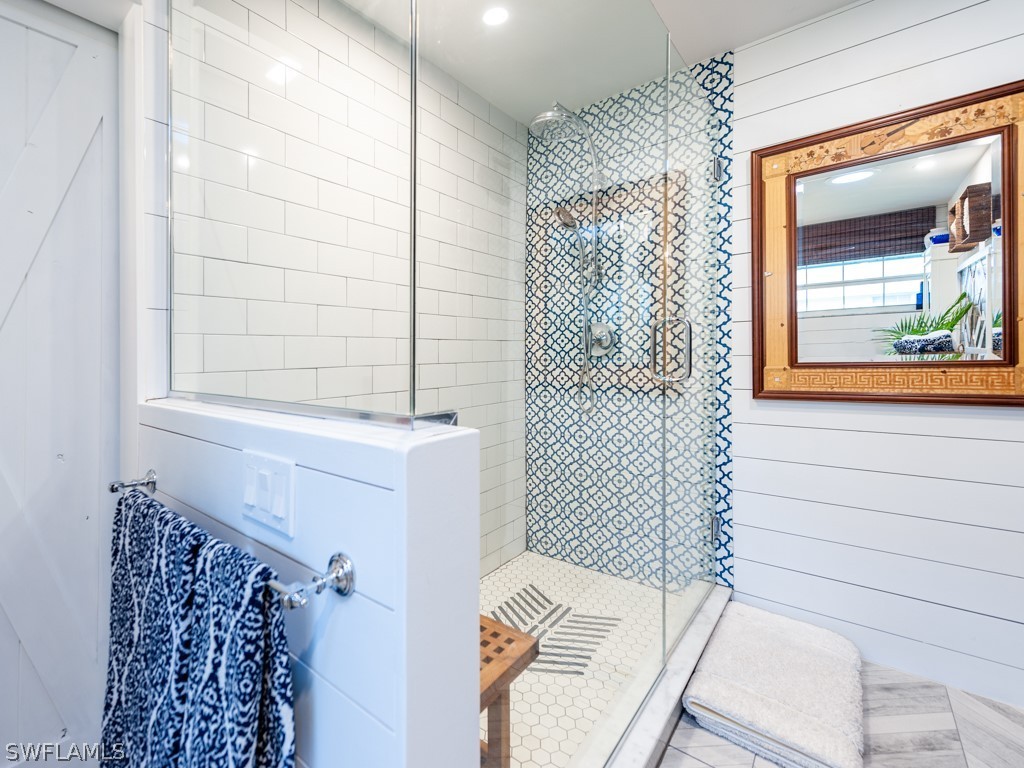 1434 Sand Castle Road Sanibel, FL 33957 - Photo 18 of 35 a bathroom with a toilet and a shower