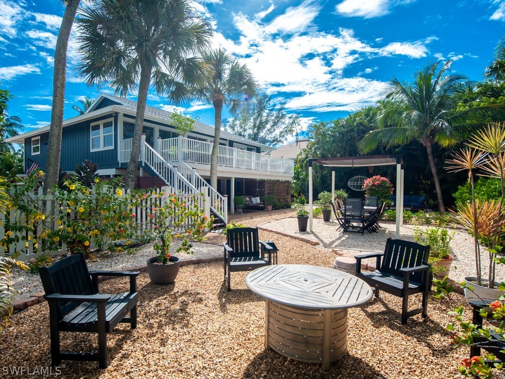 1434 Sand Castle Road Sanibel, FL 33957 - Photo 30 of 35 a building outdoor space with patio furniture