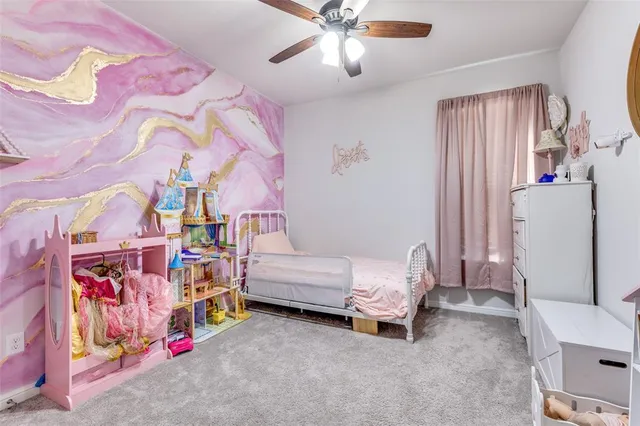 a bedroom with furniture and a bed