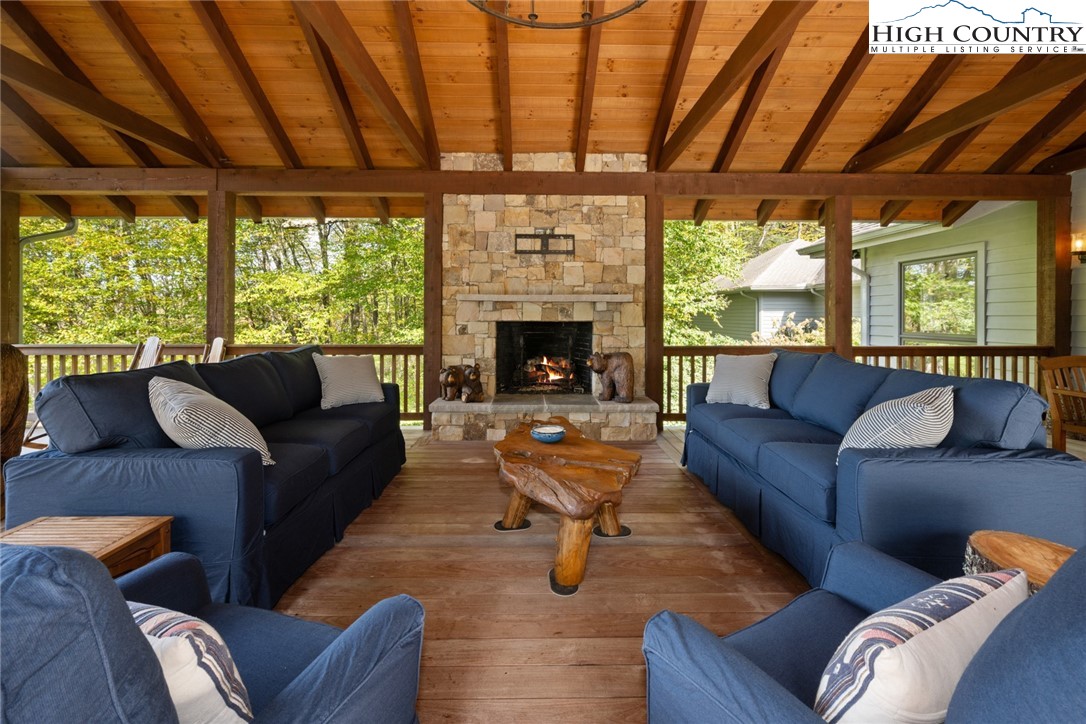 171 Balsam Road Linville, NC 28646 - Photo 15 of 49 a living room with furniture and a fireplace